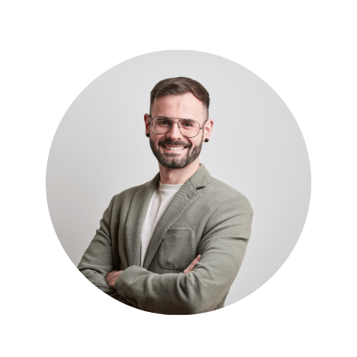 Ads call page Smiling professional man in glasses and a blazer with arms crossed Contact us