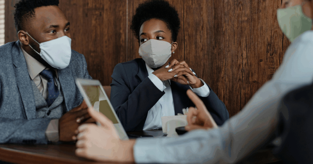 Depressive Personality Disorder Business meeting with masked professionals discussing mental health showcasing support and understanding