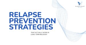 Graphic with the text Relapse Prevention Strategies That Actually Work in Long Term Recovery featuring a blue butterfly logo and flowing blue line art
