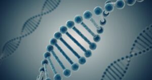 Blue 3D rendering of a DNA double helix with other helices in the background This is an informative image depicting the DNA double helix as a representation of genetics